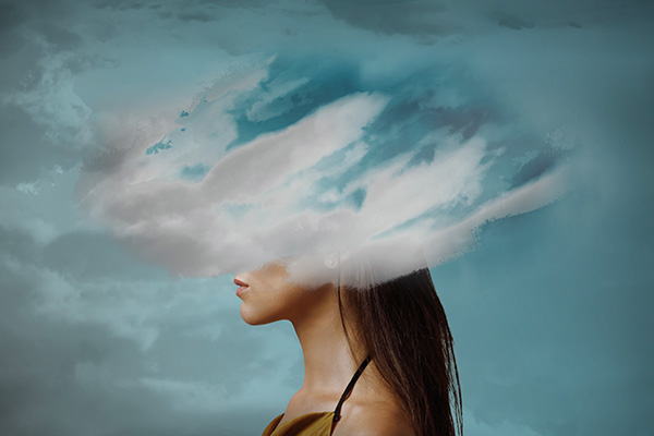 Woman head hidden by soft cloud on blue background, mental health, brain fog